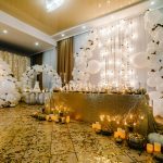 table-setting-for-wedding-decorated-arch-for-wedding-ceremony-white-balloons-candles-autumn.jpg